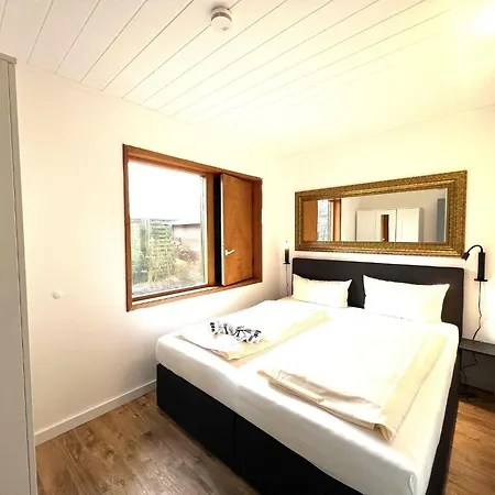 Kapitaenshaus-lassen-zimmer-nes-puek بيت ضيافة